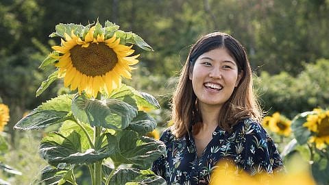 woman with sunflowers